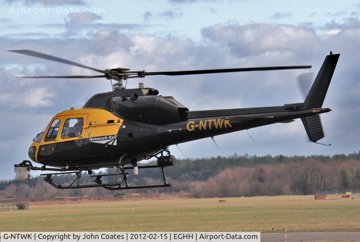 G-NTWK, 1986 Aerospatiale AS-355F-1 Twin Squirrel C/N 5347, Lift off from Sigs