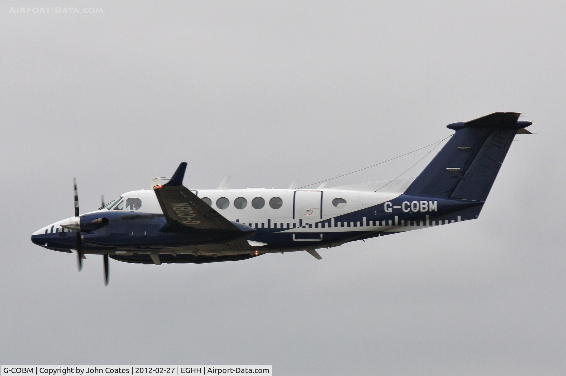 G-COBM, 1994 Beech Super King Air 350 C/N FL-124, Calibrating on a dark day