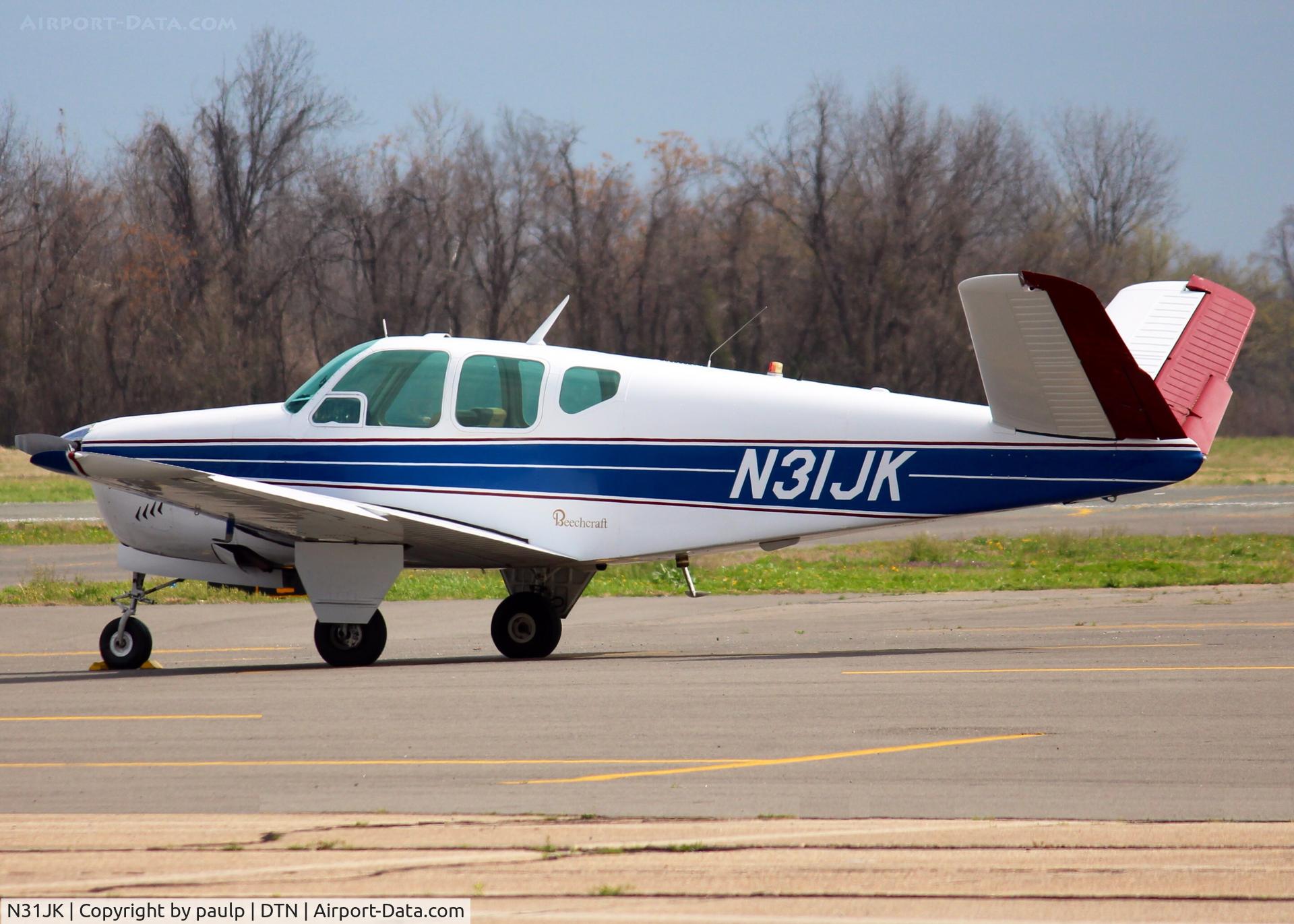 N31JK, 1960 Beech M35 Bonanza C/N D-6322, At Downtown Shreveport. Beautiful aircraft.