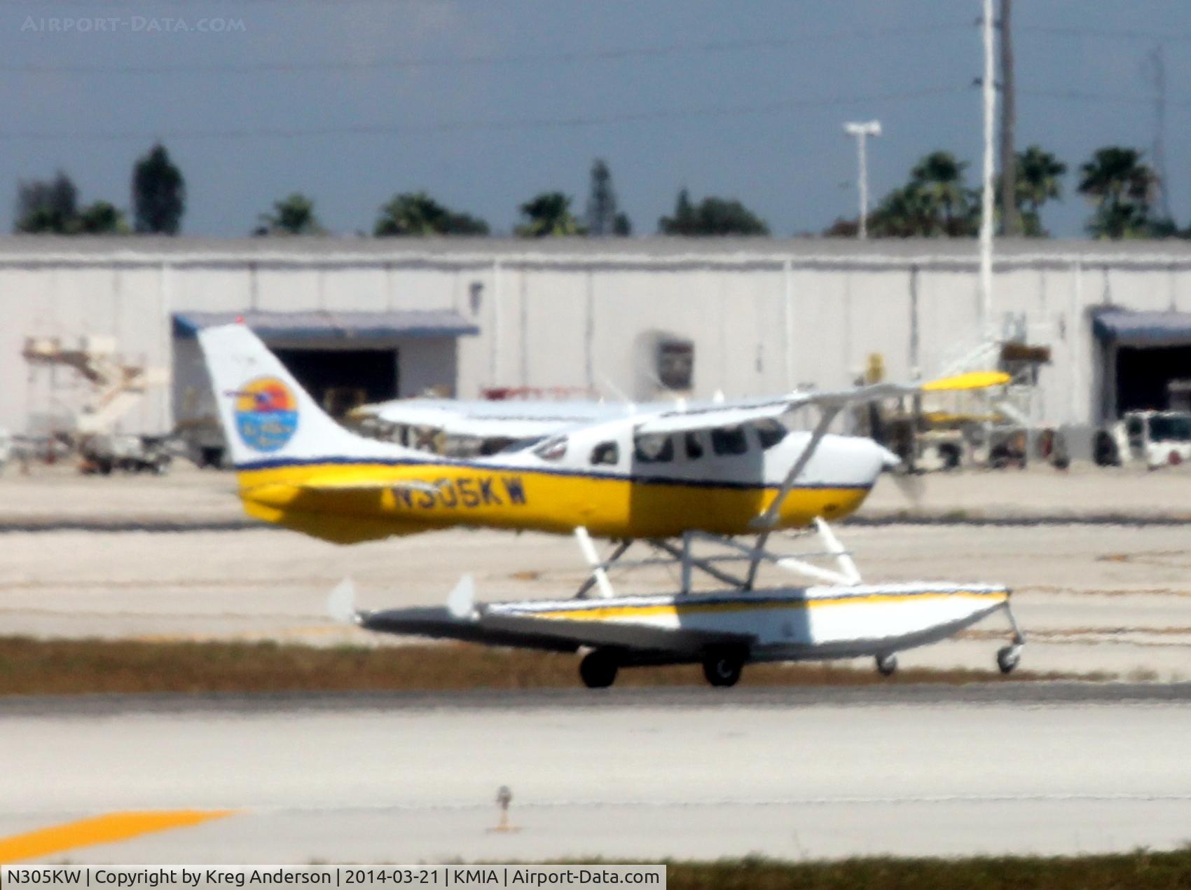 N305KW, 1978 Cessna U206G Stationair C/N U206-04213, Key West Seaplanes Cessna U206G Stationair taking off at MIA.