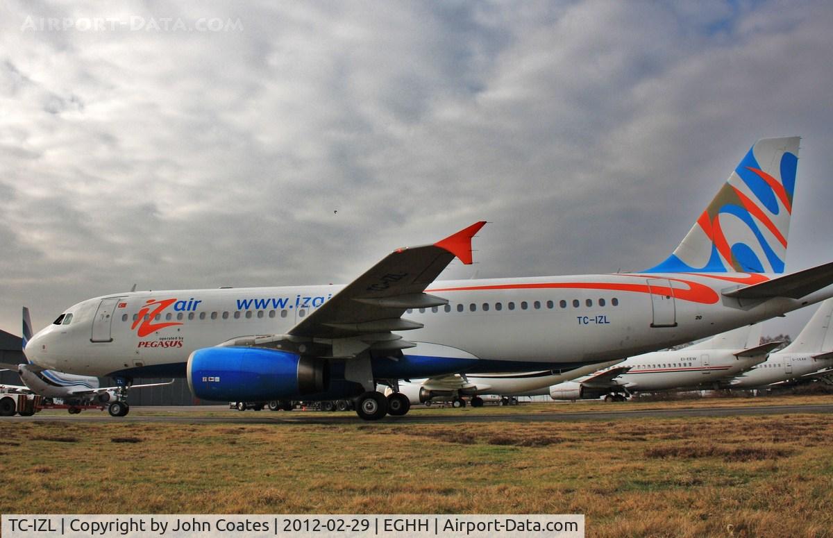 TC-IZL, 2002 Airbus A320-233 C/N 1730, At paintshop for repaint to Atlasjet