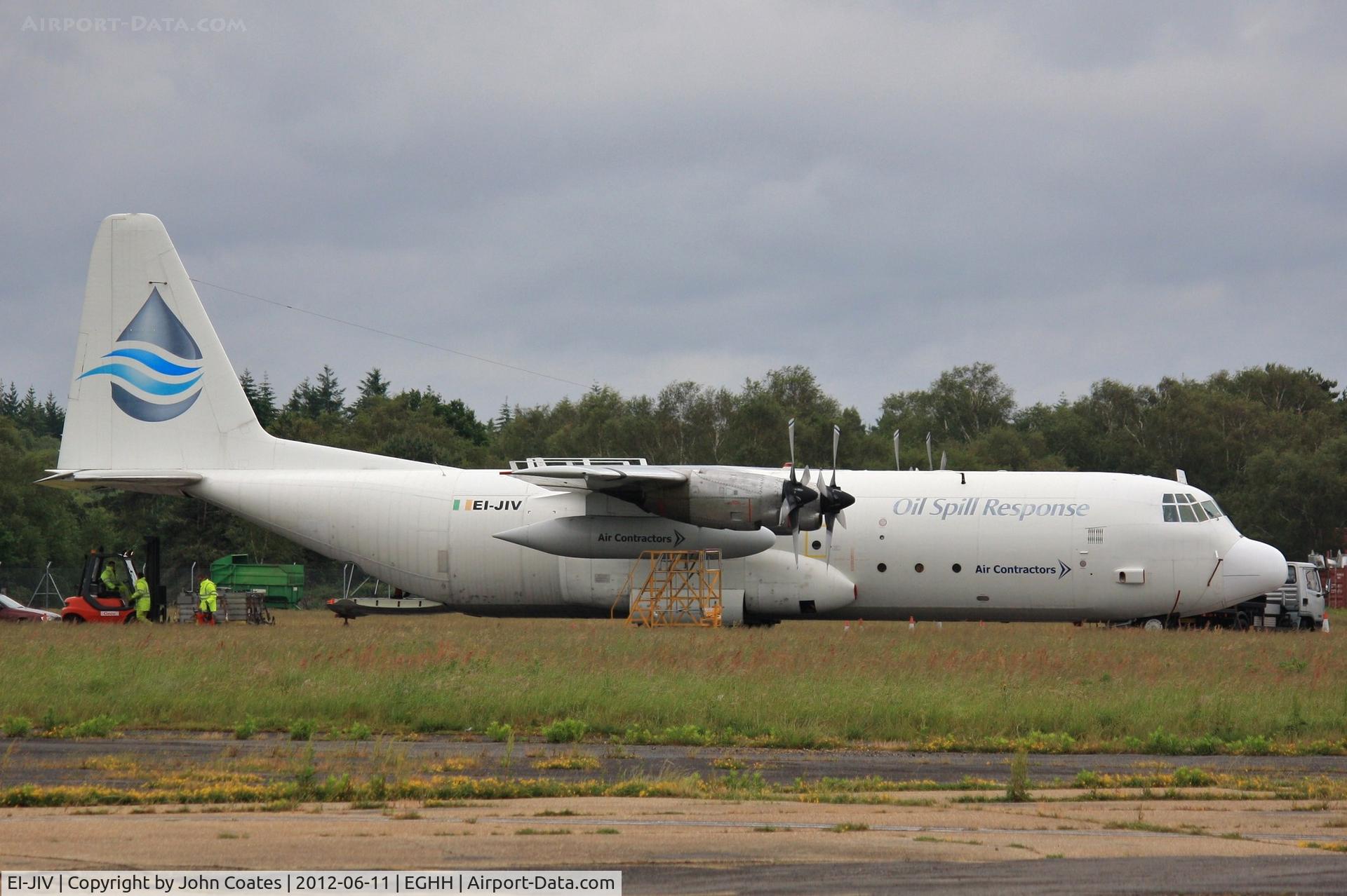 EI-JIV, 1976 Lockheed L-100-30 Hercules (L-382G) C/N 382-4673, Being loaded for an Oil Spill Exercise
