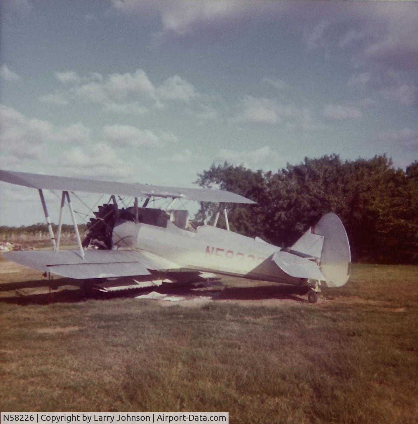 N58226, 1937 Boeing A75 (PT-13A) C/N 75-076, I shot this in the early 1970's at a crop duster strip South of florida City, FL.