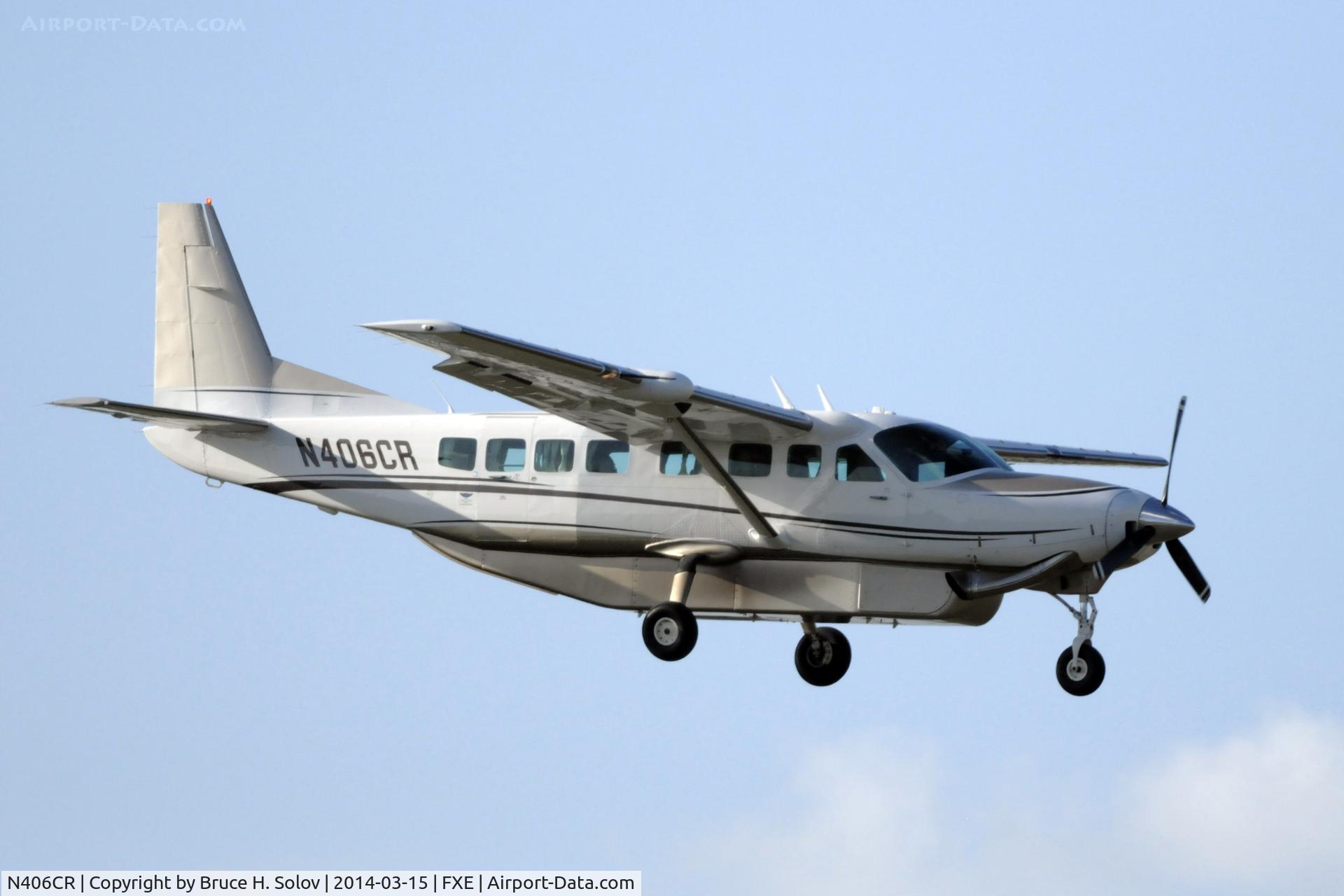 N406CR, Cessna 208B C/N 208B2170, on approach to FXE