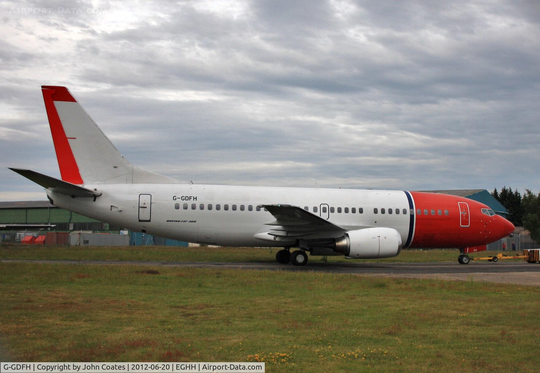 G-GDFH, 1993 Boeing 737-3Y5 C/N 25615, Arriving at paintshop for paint to Jet 2