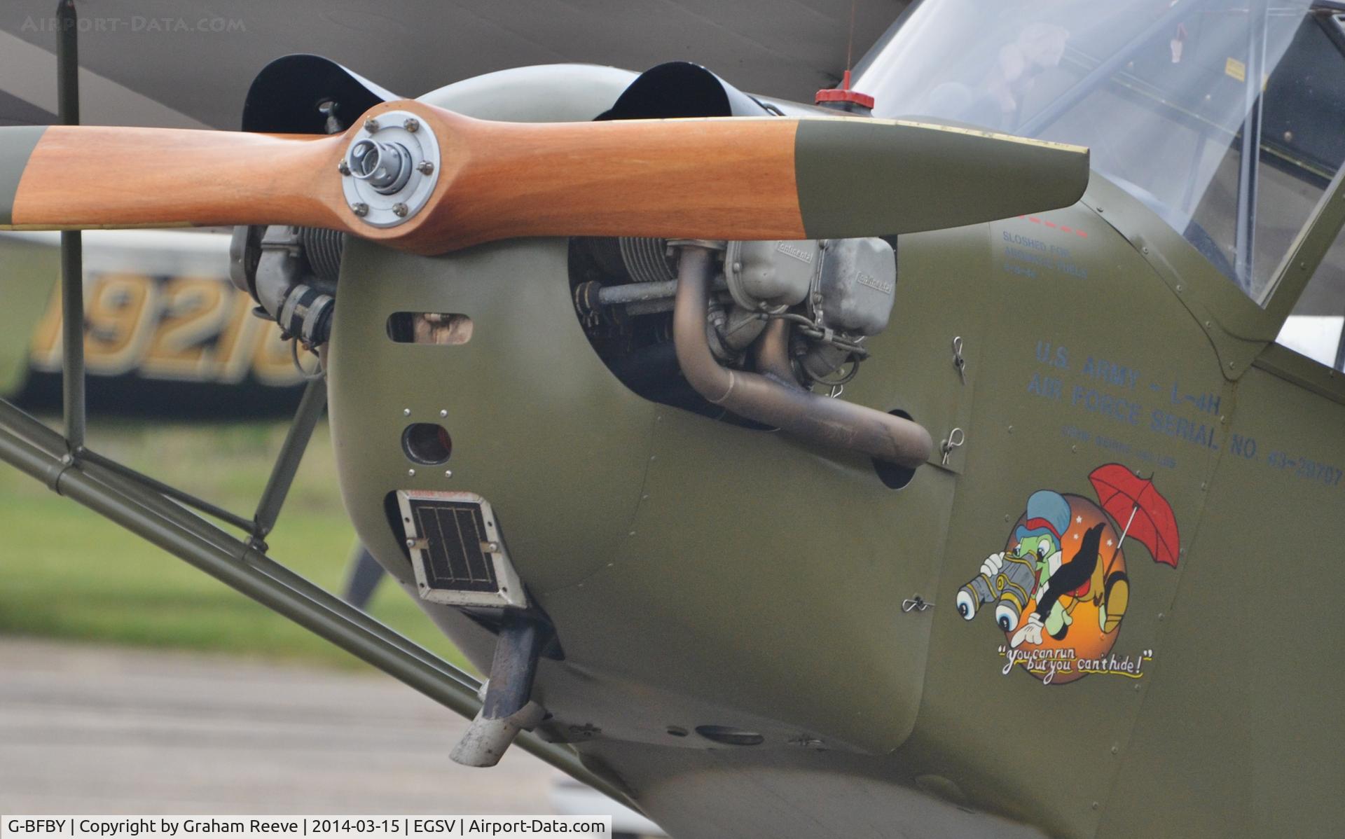 G-BFBY, 1944 Piper L-4H Grasshopper (J3C-65D) C/N 10998, Nose art and engine on G-BFBY.