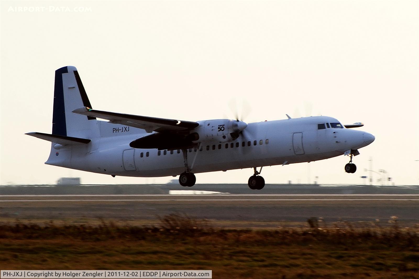 PH-JXJ, 1991 Fokker 50 C/N 20232, Rising out of green like a fat duck....