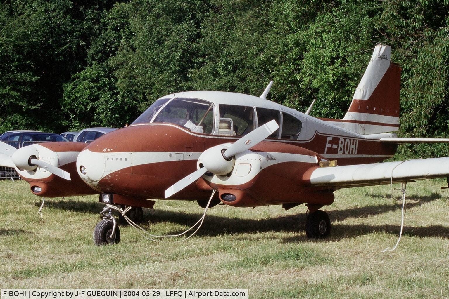 F-BOHI, Piper PA-23-250 Aztec C/N 27319, Parked at La Ferté-Alais, 2004 airshow.