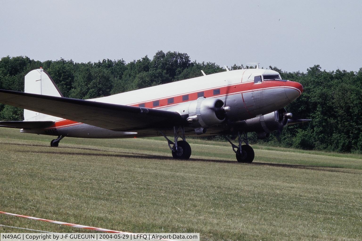 N49AG, 1943 Douglas DC-3A C/N 11737, Taxiing after landing at La Ferté-Alais, 2004 airshow.