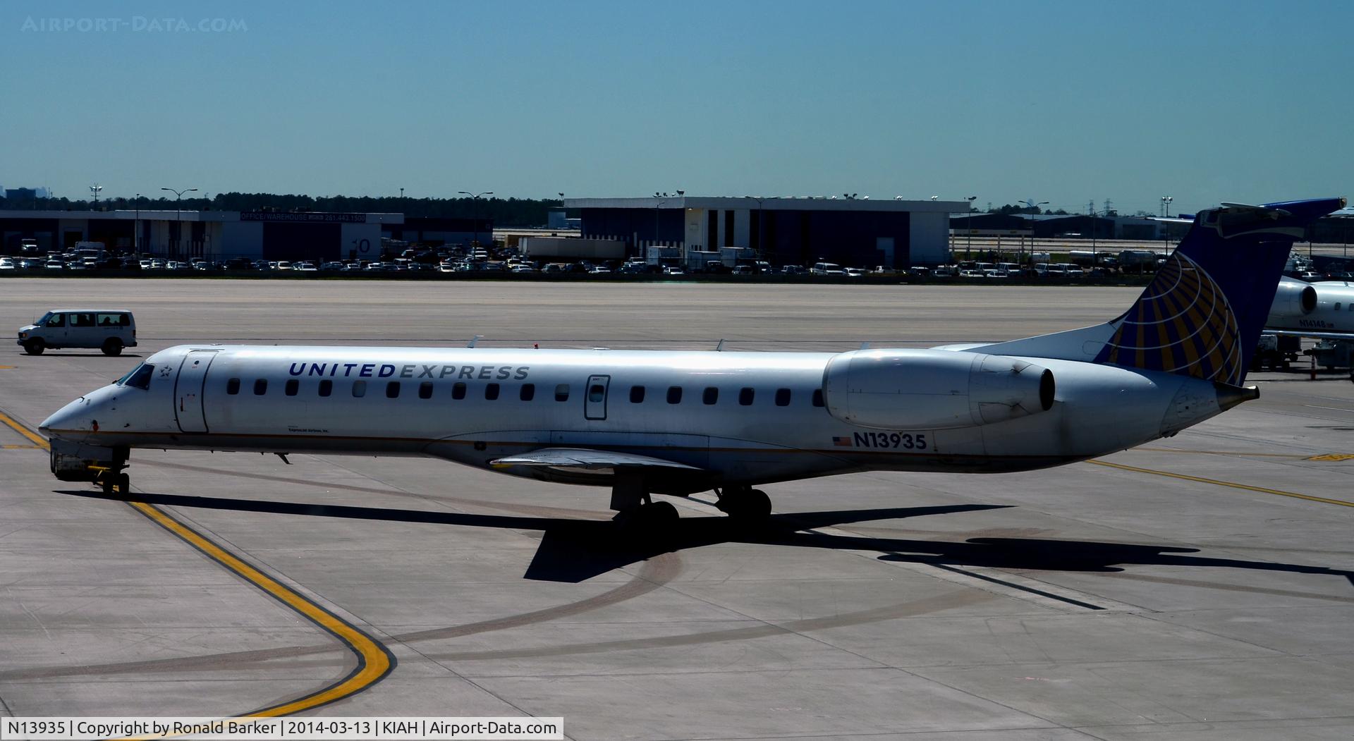 N13935, 1997 Embraer EMB-145EP (ERJ-145EP) C/N 145.022, Pushback Houston