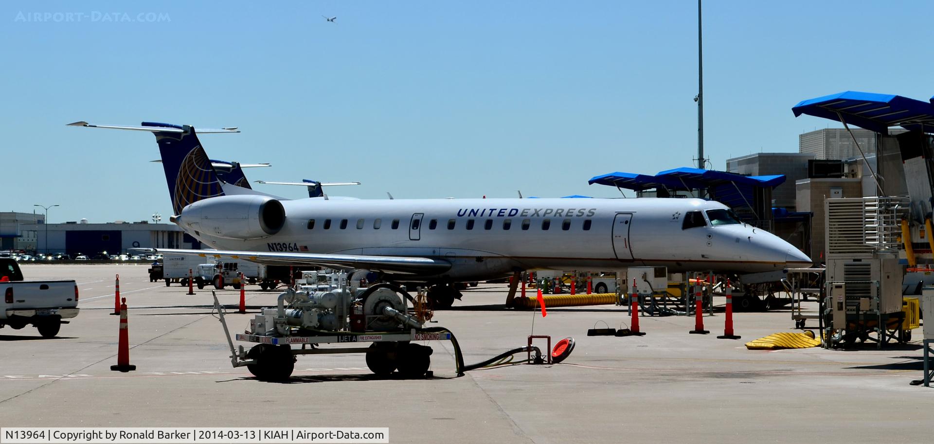 N13964, 1999 Embraer ERJ-145LR (EMB-145LR) C/N 145123, At the gate Houston