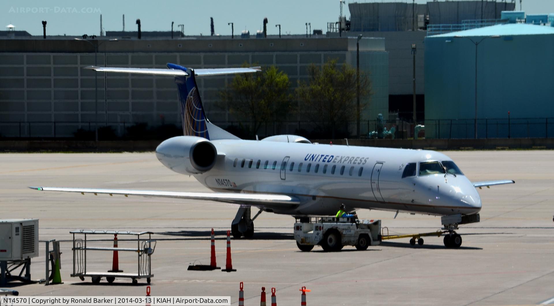 N14570, 2002 Embraer ERJ-145LR (EMB-145LR) C/N 145632, Pushback Houston