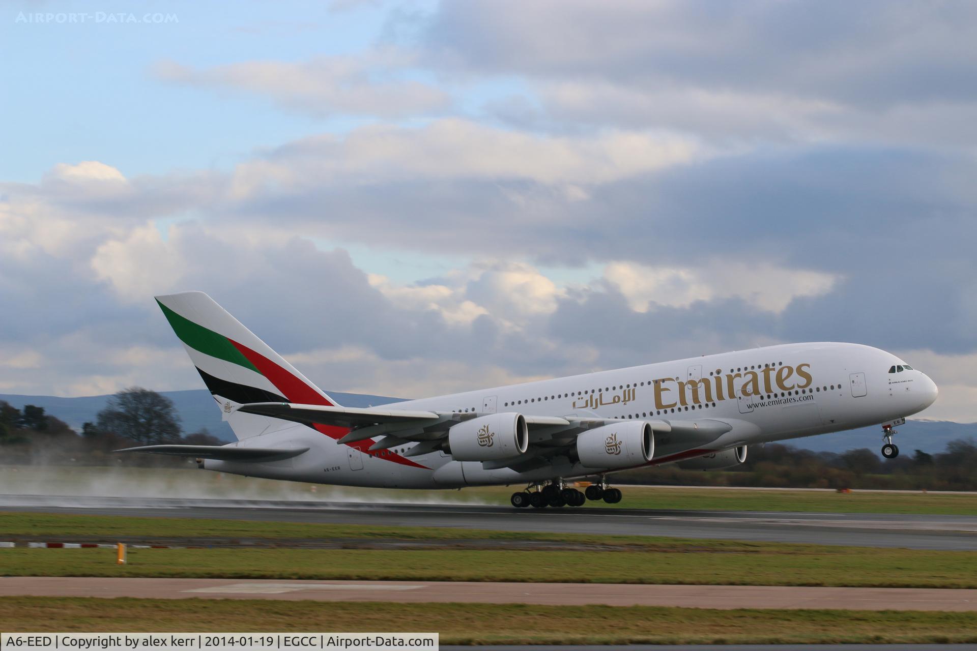 A6-EED, 2012 Airbus A380-861 C/N 111, a380 departing manchester gloomy day