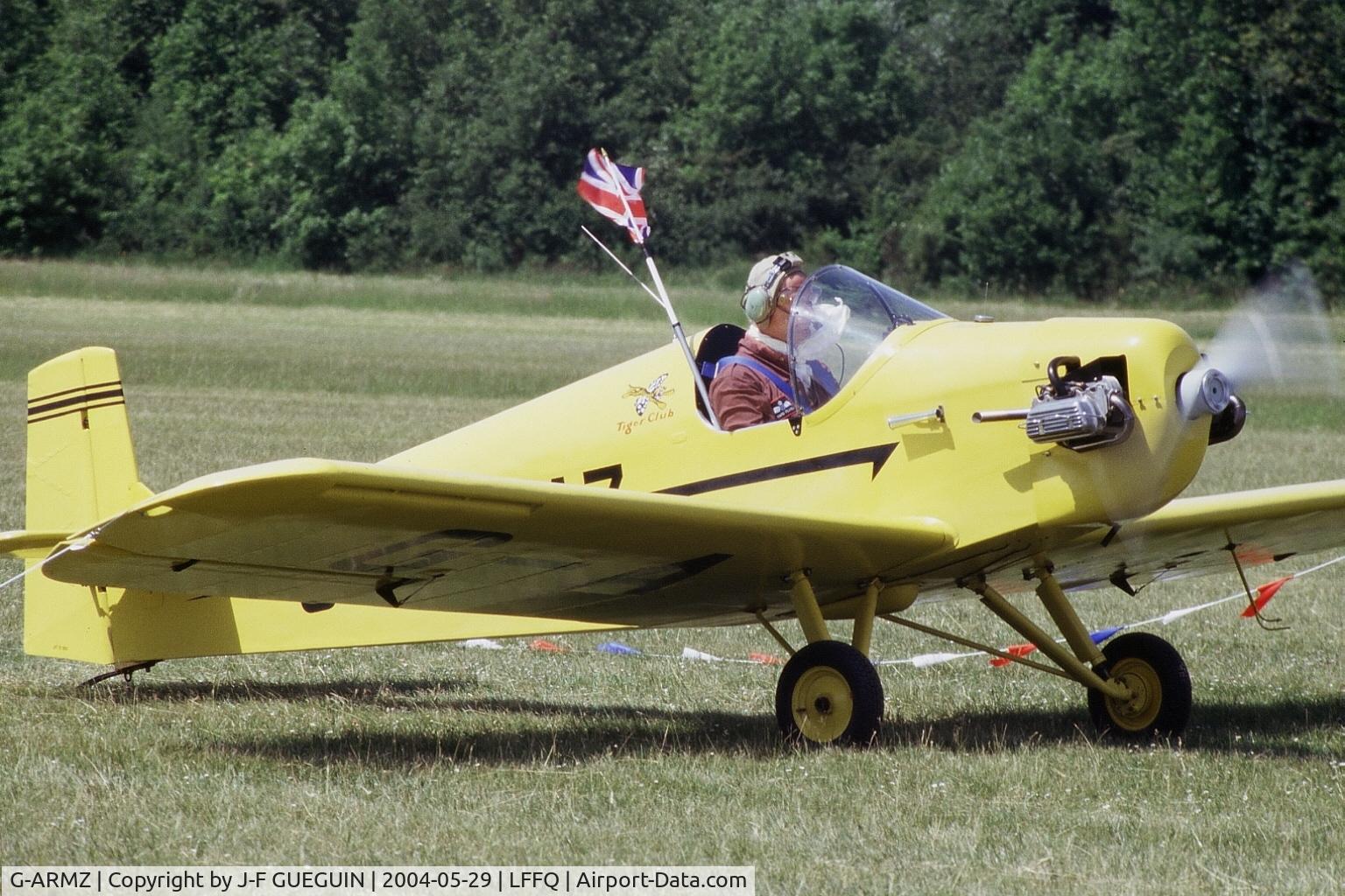 G-ARMZ, 1961 Rollason Druine D.31 Turbulent C/N PFA 565, Taxiing after landing at La Ferté-Alais, 2004 airshow, with a British flag to commemorate the centenary of the 
