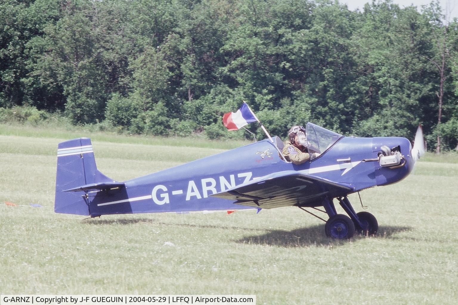 G-ARNZ, 1961 Rollason Druine D.31 Turbulent C/N PFA 579, Taxiing after landing at La Ferté-Alais, 2004 airshow, with a French flag to commemorate the centenary of the 