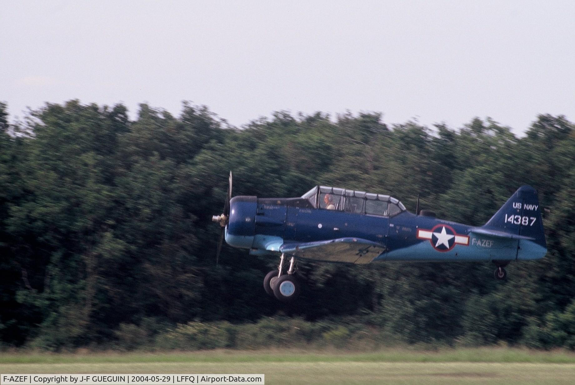 F-AZEF, North American T-6G Texan C/N 182-074, Taking off at La Ferté-Alais, 2004 airshow.