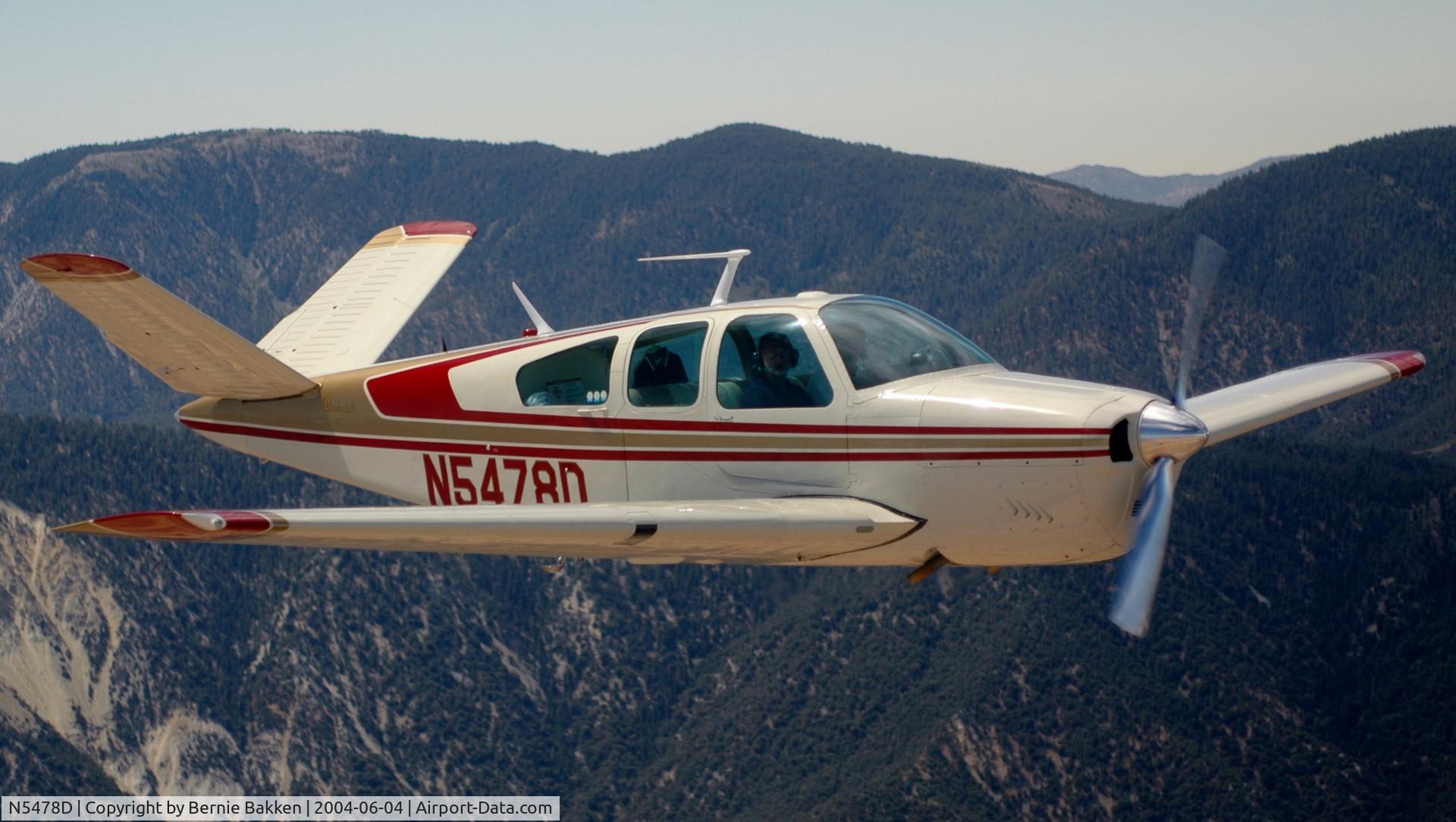 N5478D, 1957 Beech H35 Bonanza C/N D-4985, Air to air west of Bakersfield from C-195 from RIR to PRB