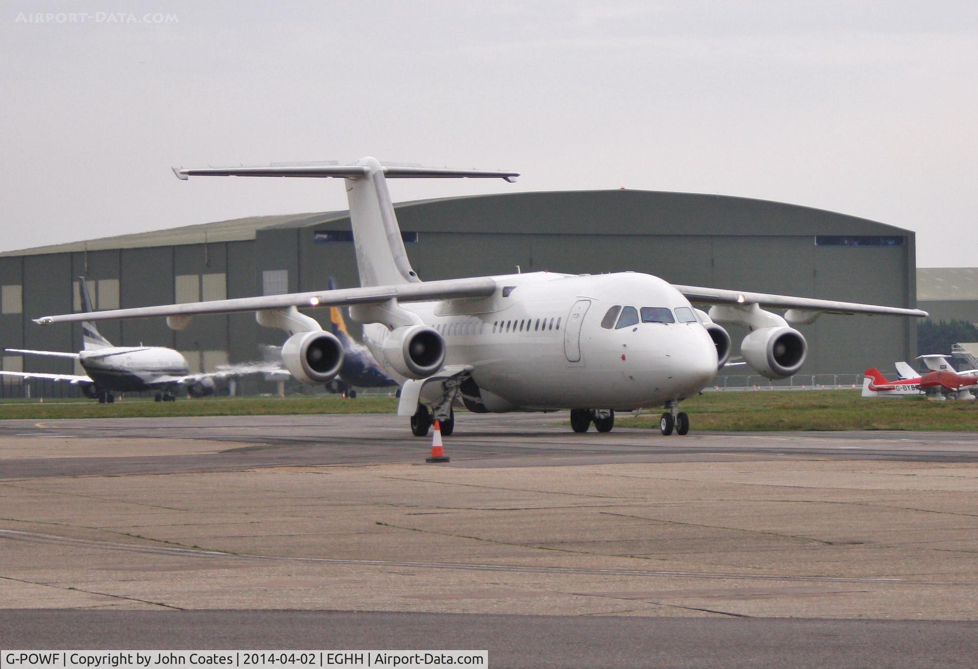 G-POWF, 2000 British Aerospace Avro 146-RJ100 C/N E3373, Taxiing to paintshop