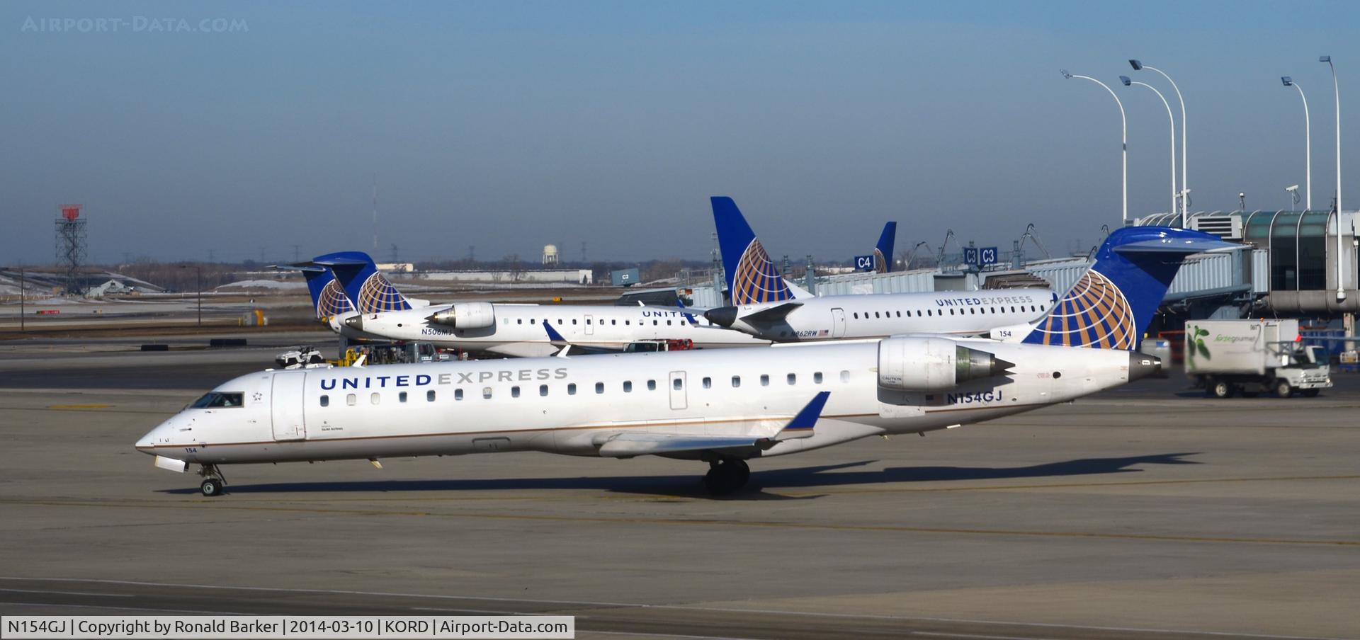 N154GJ, 2005 Bombardier CRJ-702 (CL-600-2C10) Regional Jet C/N 10224, Taxi Chicago