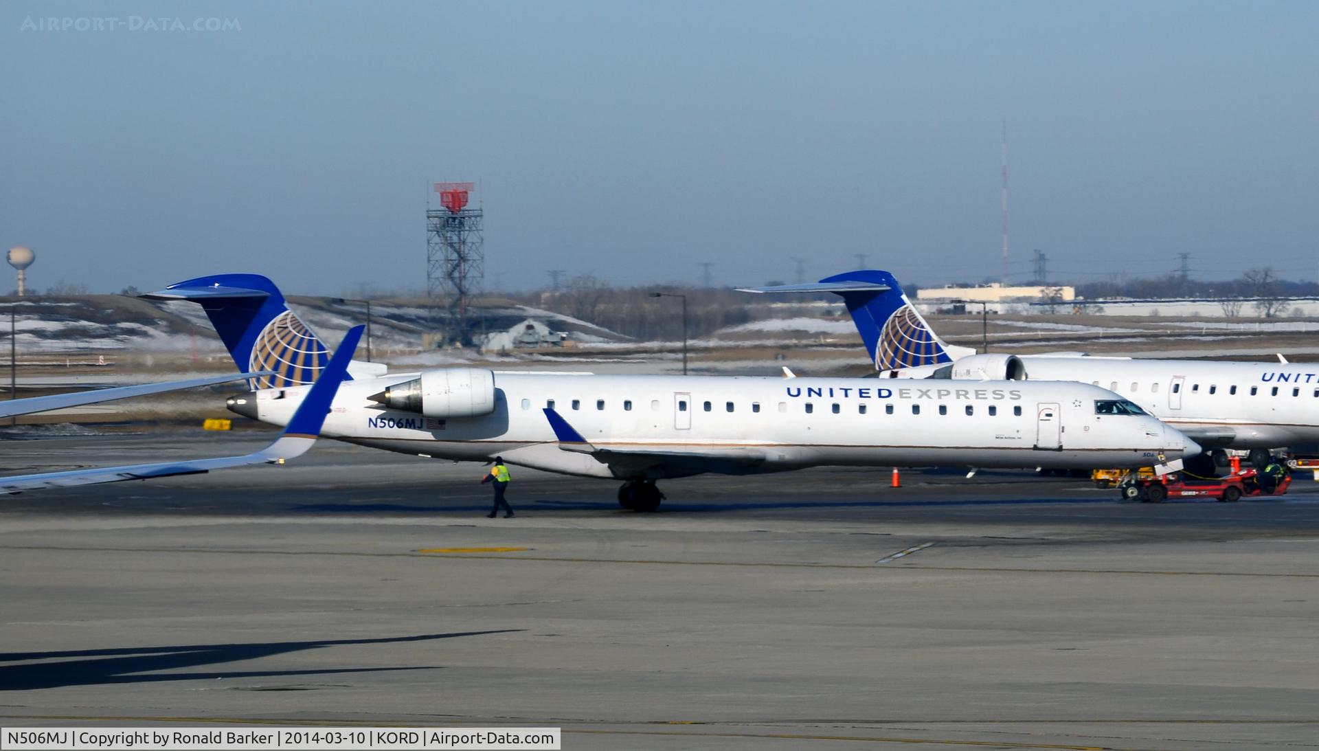 N506MJ, 2002 Bombardier RJ-700 (CL-600-2C10) Regional Jet C/N 10073, Pushback Chicago