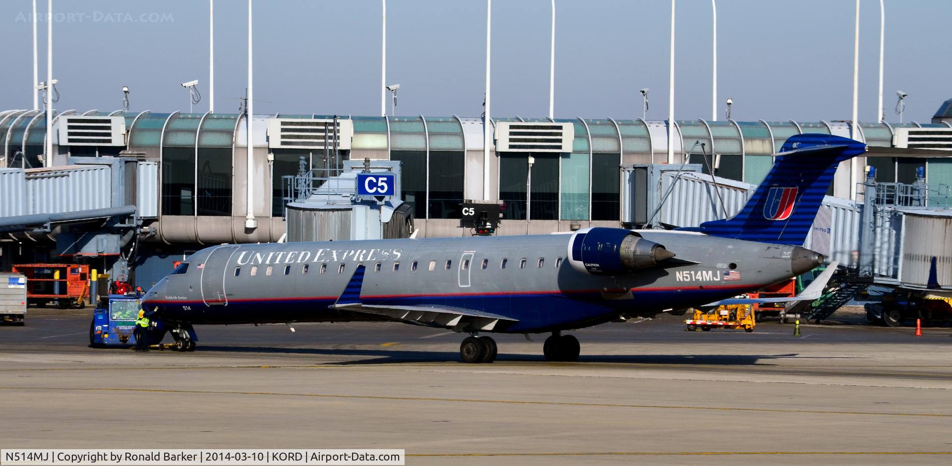 N514MJ, 2003 Bombardier CRJ-700 (CL-600-2C10) Regional Jet C/N 10116, Pushback Chicago