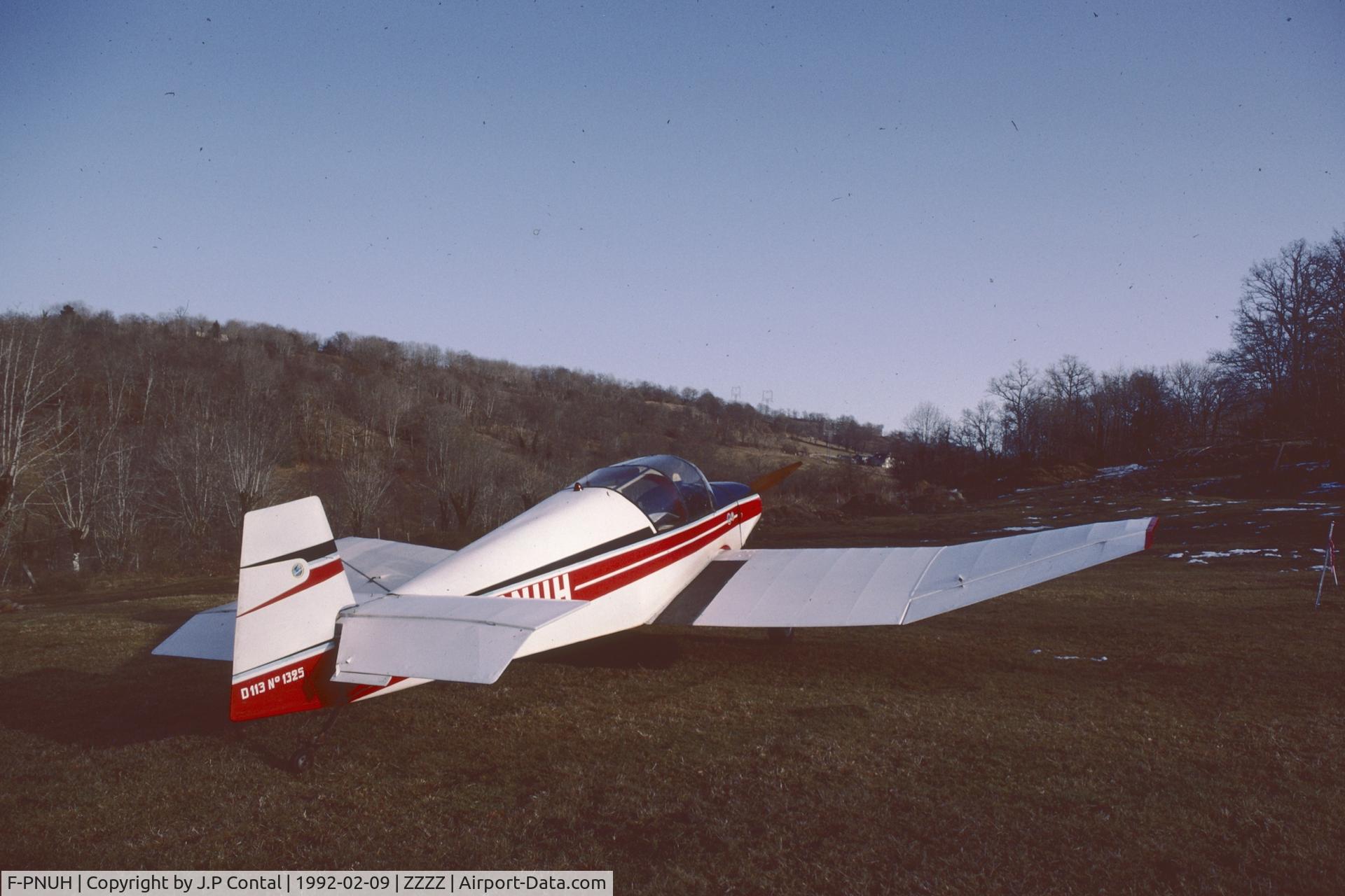 F-PNUH, Jodel D-113 C/N 1325, «Le Faoula», a one way sloped backcountry airstrip in northern Aveyron, France ; F-PNUH is parked at the end of the strip.  
Scanned Kodachrome_25 (Olympus OM-1n camera, Zuiko 24mm f2.8 lens).