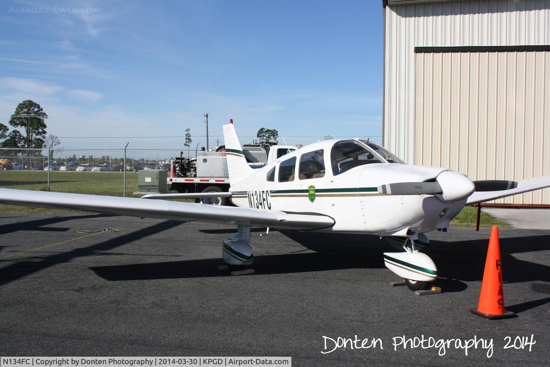 N134FC, 1982 Piper PA-28-181 C/N 28-8290169, Florida Division of Forestry Cherokee (N134FC) on display at the Florida International Air Show