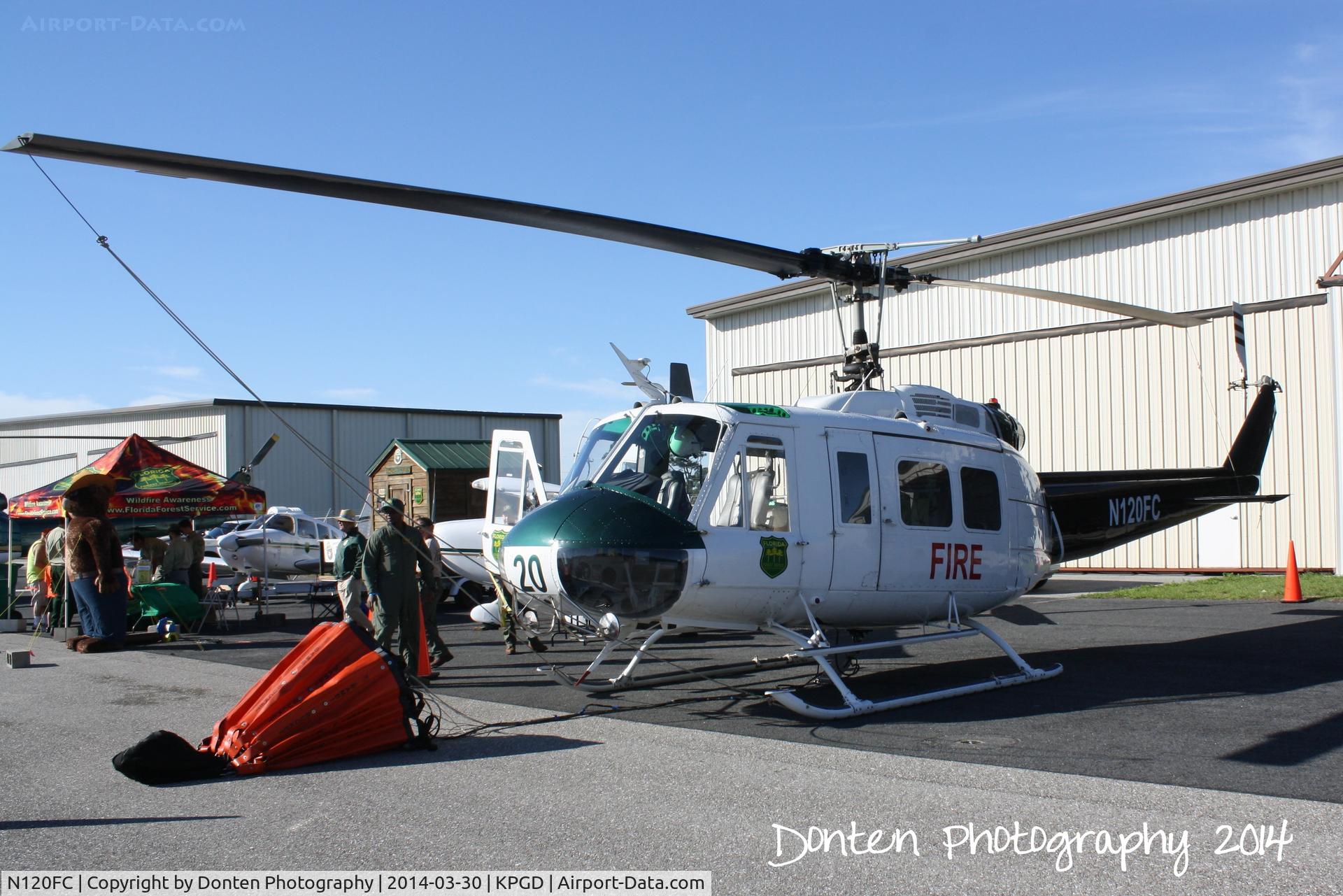 N120FC, Bell UH-1E C/N 152428, Florida Division of Forestry Bell UH-1 Iroquois (N120FC) on display at Florida International Air Show