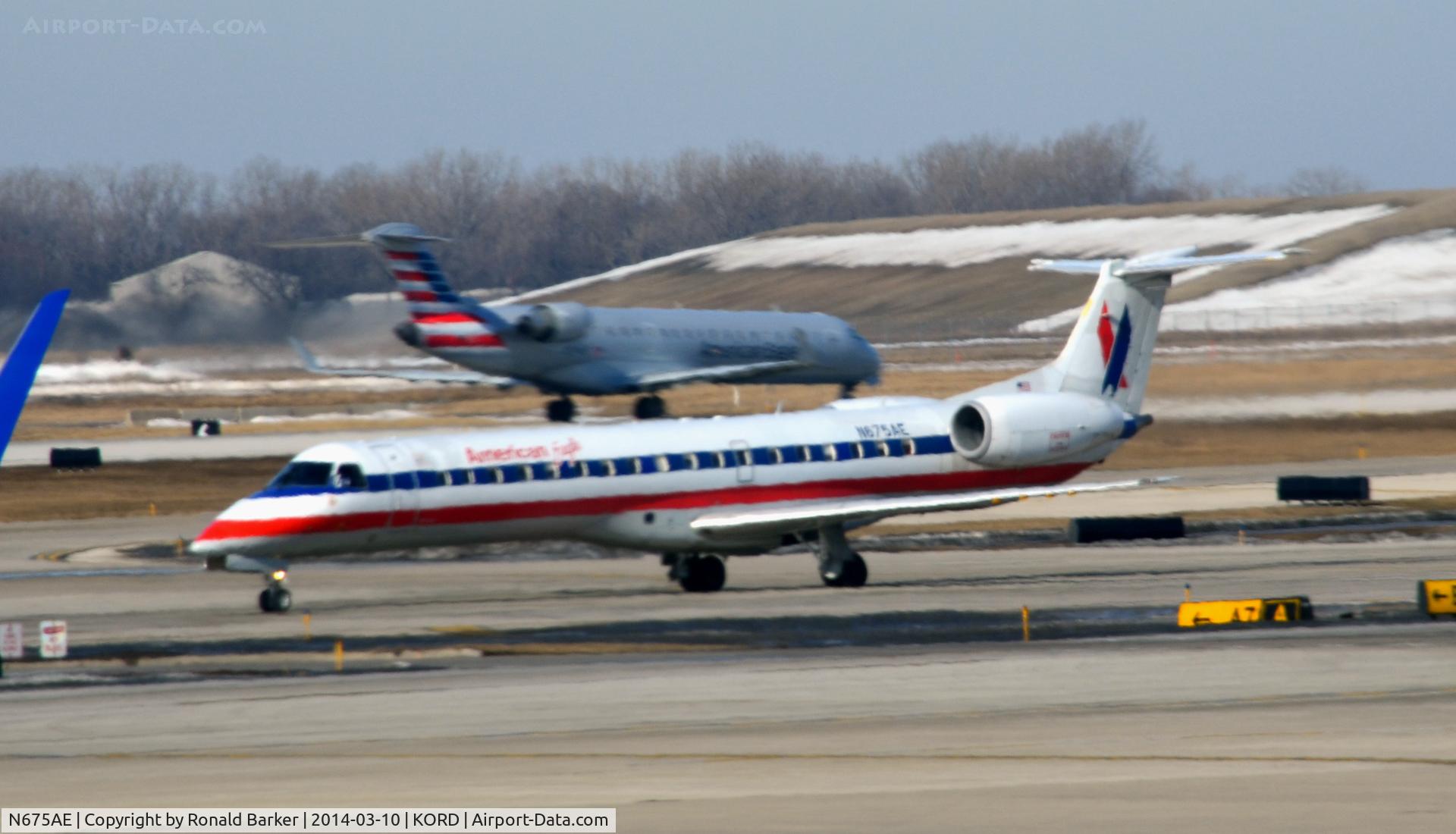 N675AE, 2004 Embraer ERJ-145LR (EMB-145LR) C/N 14500806, Taxi Chicago