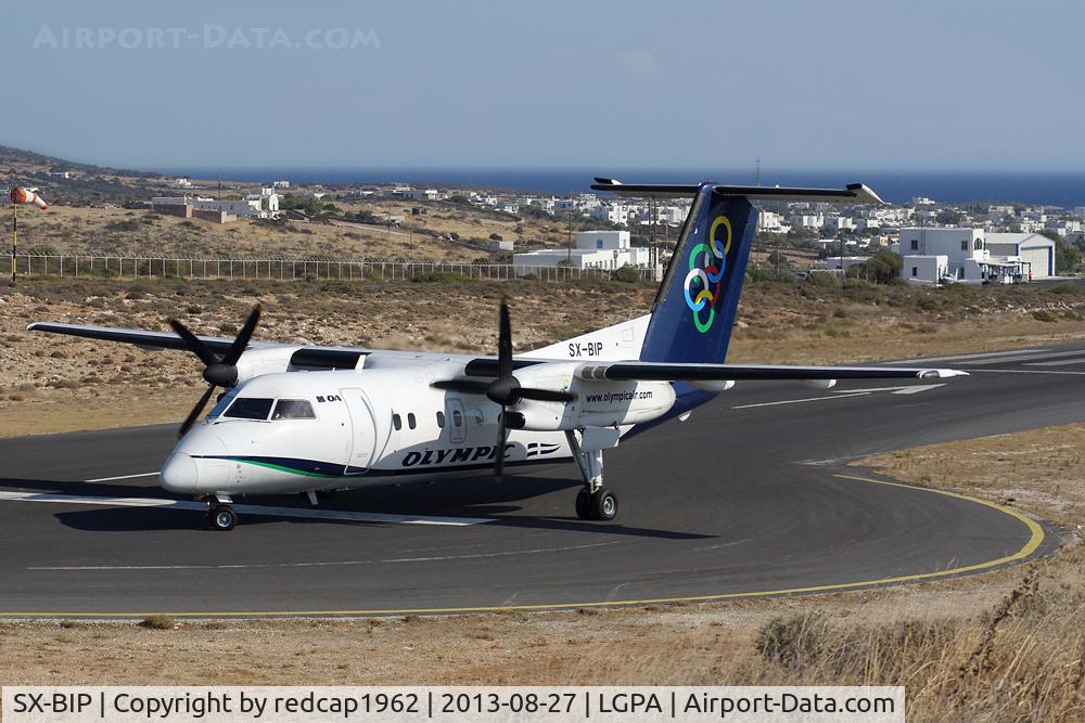 SX-BIP, 1992 De Havilland Canada DHC-8-102 Dash 8 C/N 347, About to turn & backtrack after arrival from ATH. The tiny terminal building is on top right.