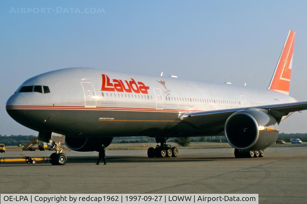 OE-LPA, 1997 Boeing 777-2Z9/ER C/N 28698, Press presentation with Mr. Lauda in the cockpit. Towed in in front of the AUA-Hangar.