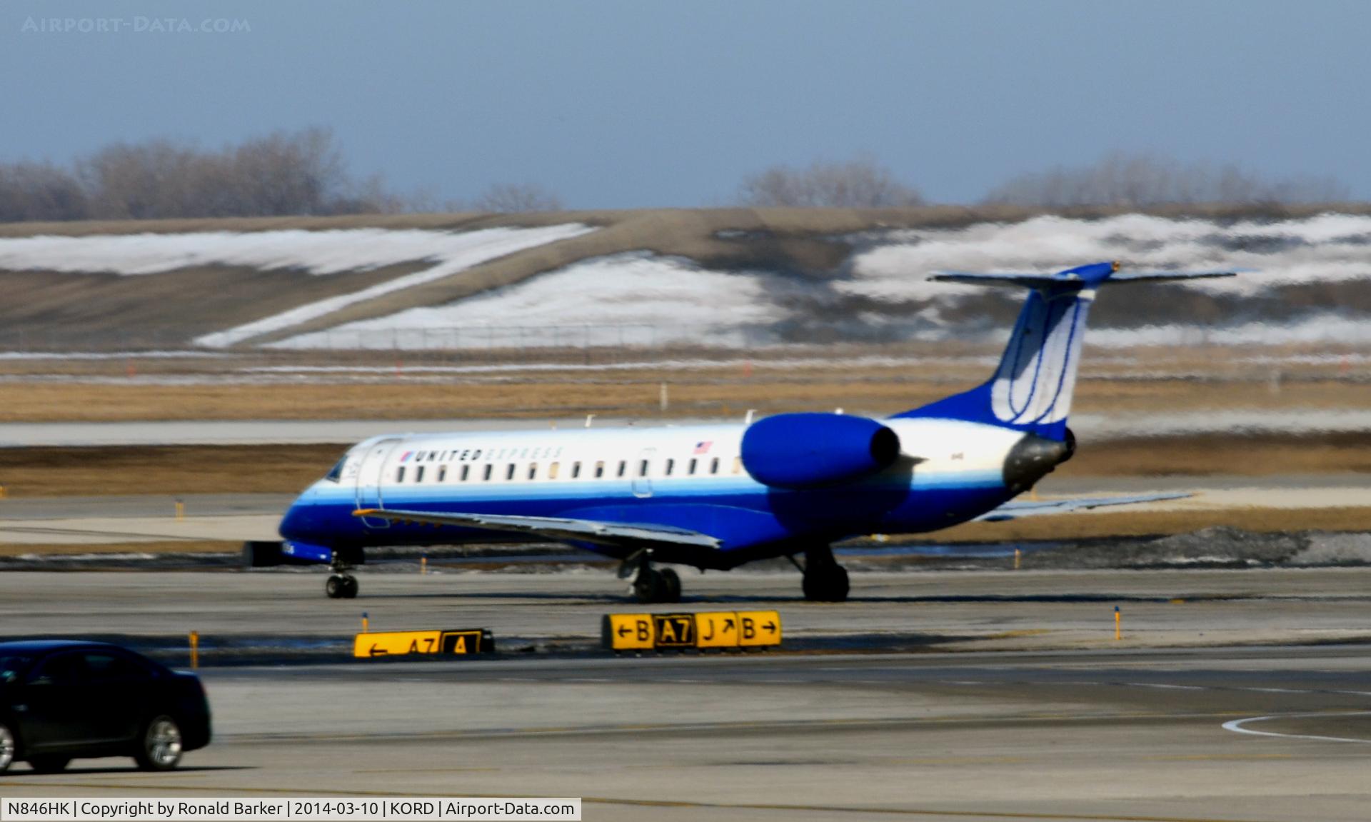 N846HK, 2004 Embraer ERJ-145LR (EMB-145LR) C/N 14500855, Taxi for takeoff Chicago