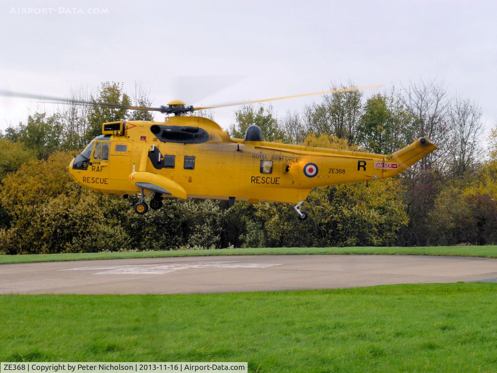 ZE368, 1985 Westland Sea King HAR.3 C/N WA947, Sea King HAR.3 of 202 Squadron at RAF Boulmer departing from the Cumberland Infirmary in November 2013.