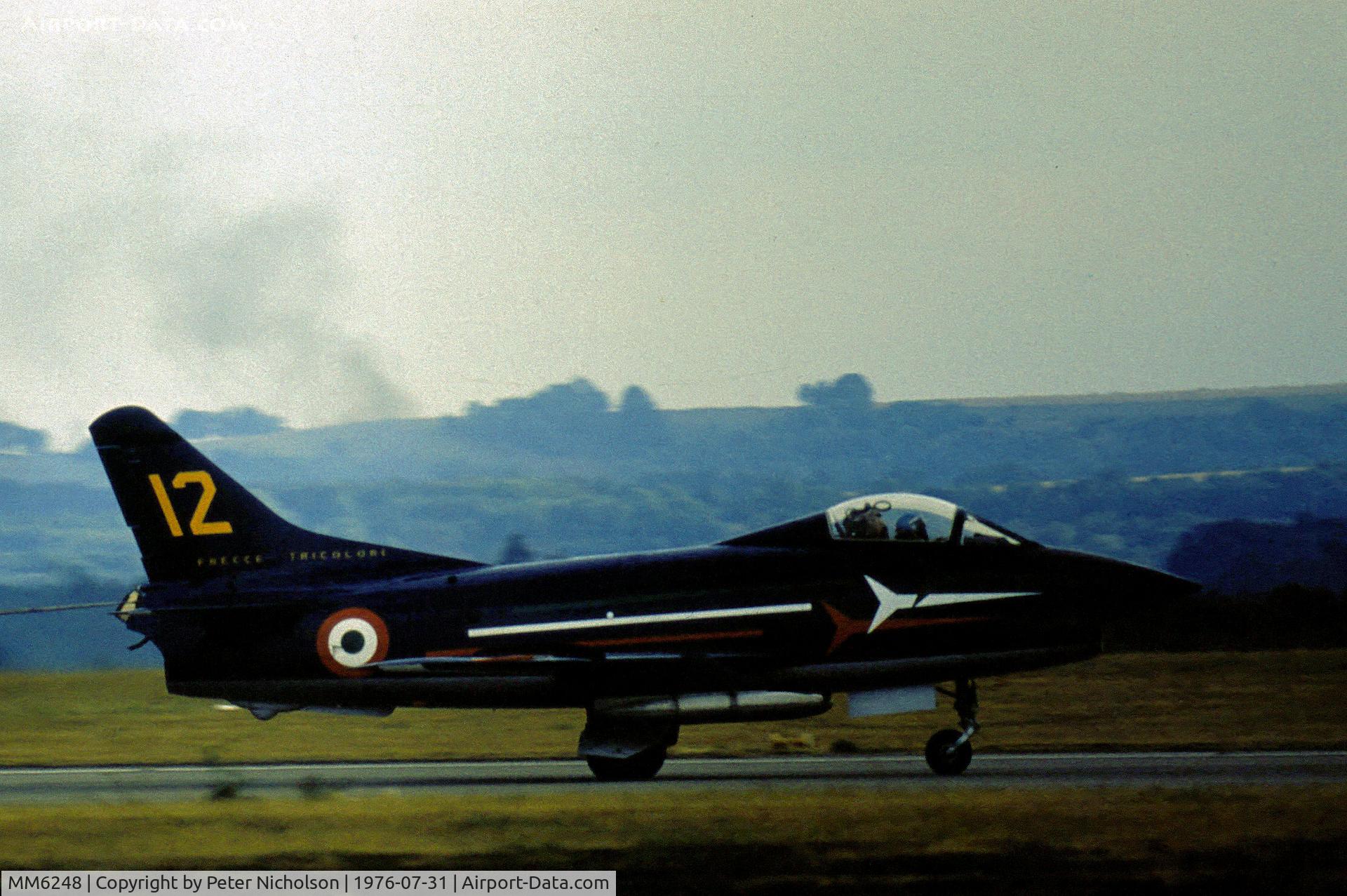 MM6248, Fiat G-91PAN C/N 14, G-91PAN number 12 of the Italian Air Force's Frecce Tricolori display team in action at the 1976 Intnl Air Tattoo at RAF Greenham Common.