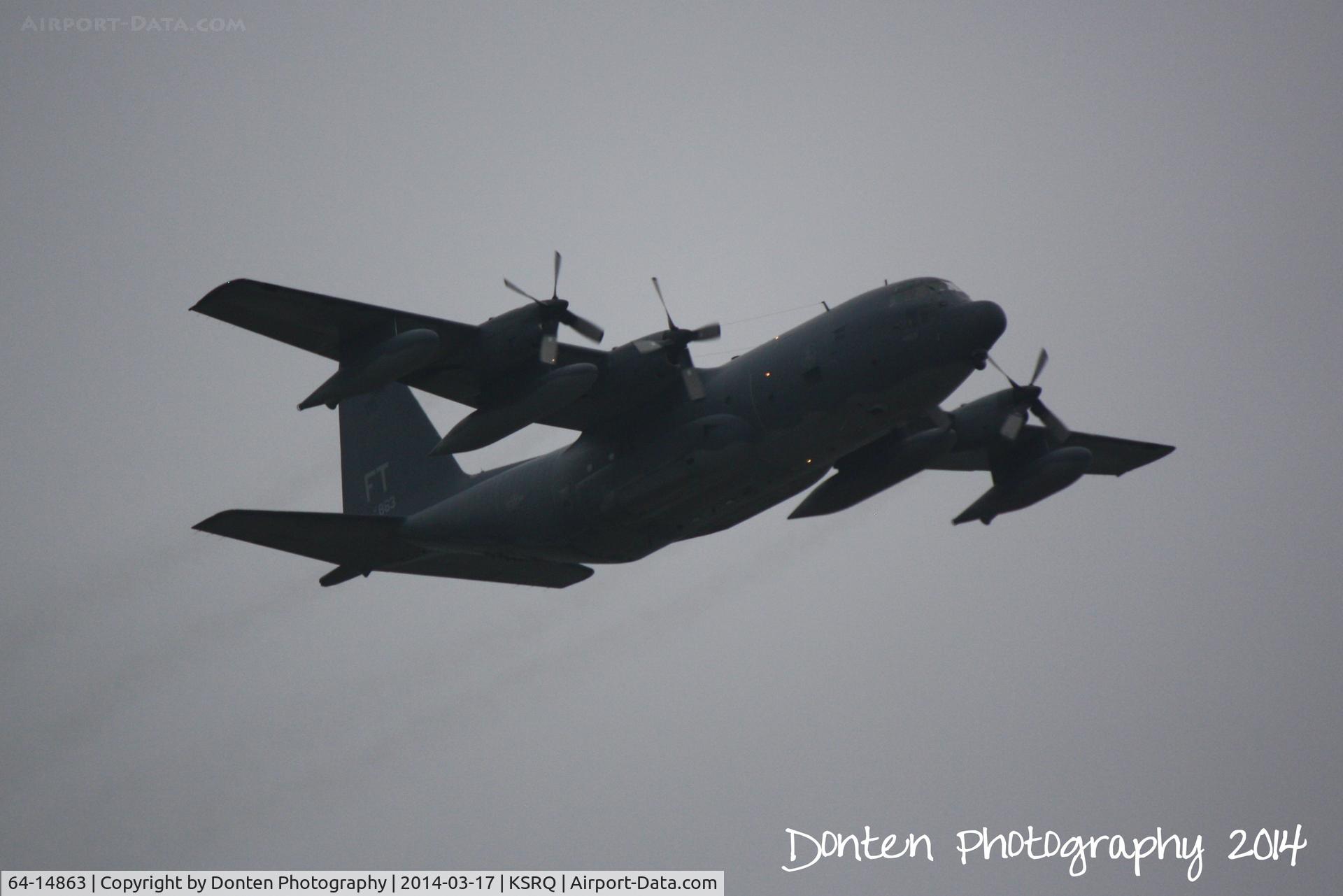 64-14863, 1964 Lockheed HC-130P Hercules C/N 382-4094, USAF C-130 (64-14863) from Pope Air Force Base perfoms a touch and go at Sarasota-Bradenton International Airport