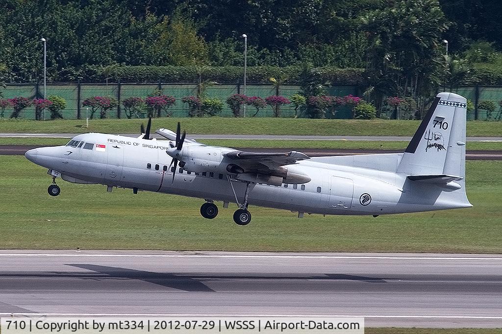710, 1993 Fokker 50 C/N 20268, Good view from Crowne Plaza Changi with view over one of the runways.  Singapore AF Fokker 50 seen departing.