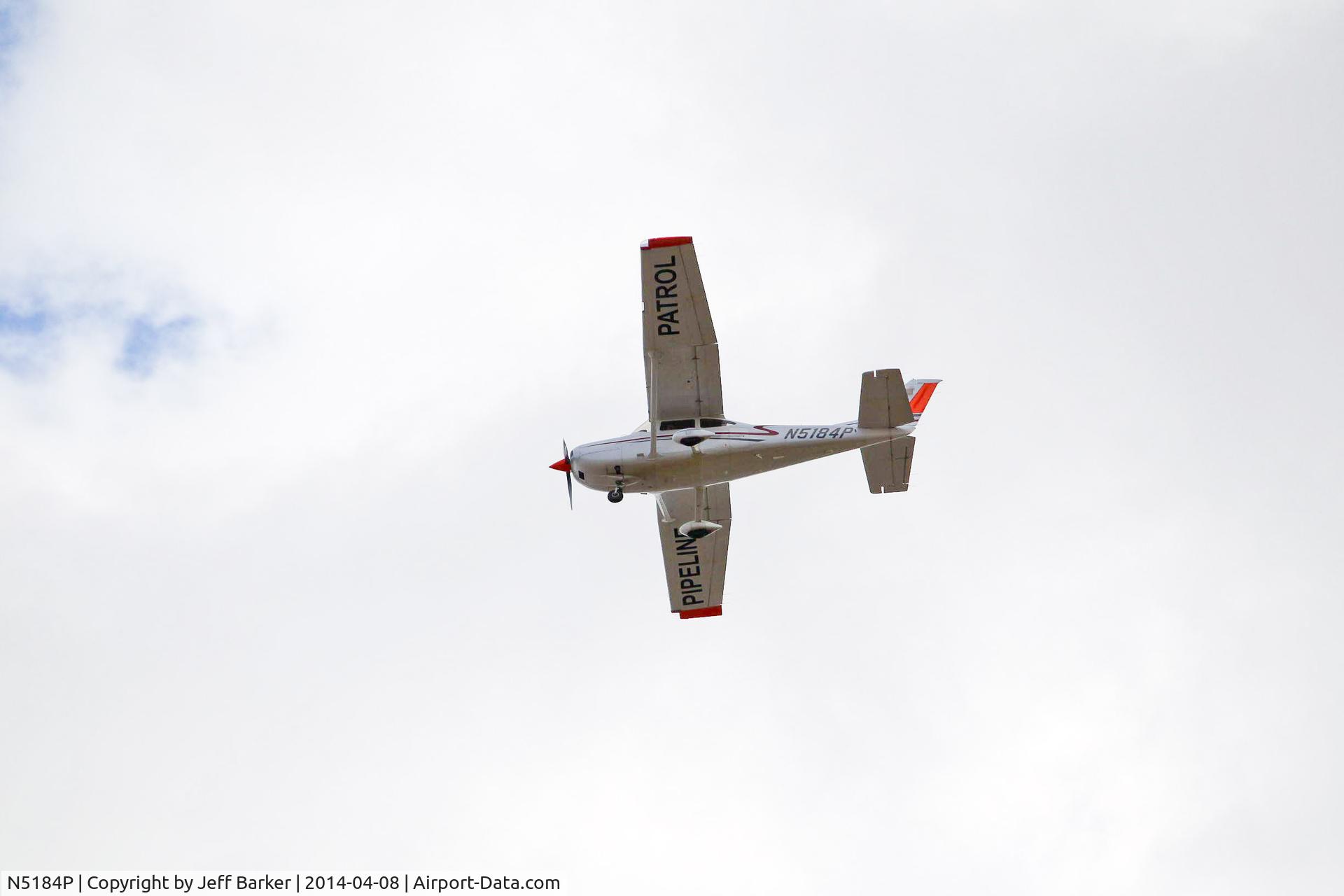 N5184P, 2002 Cessna 182T Skylane C/N 18281105, As seen Apr. 8, about 5:30 p.m. CDT, over Edgewood, IA.  Was covering a track meet when I looked up and snapped this picture.