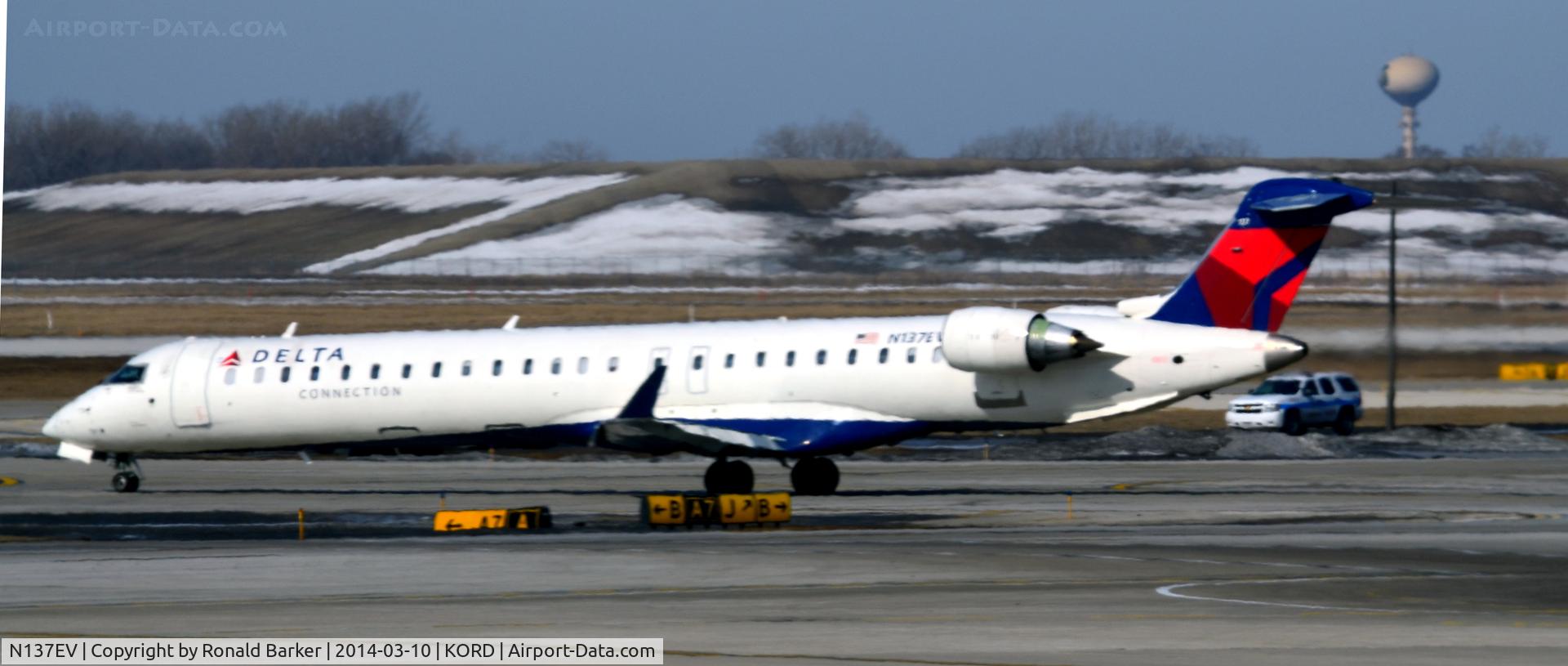 N137EV, 2009 Bombardier CRJ-900ER (CL-600-2D24) C/N 15227, Taxi Chicago