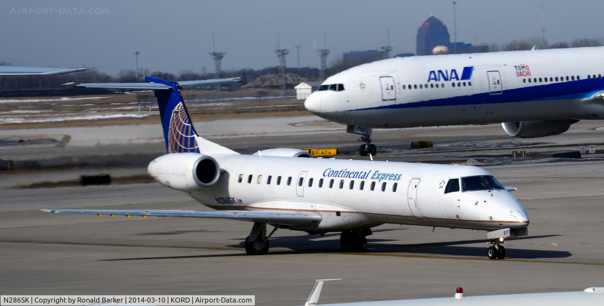 N286SK, 2001 Embraer EMB-145LR C/N 145443, Taxi Chicago