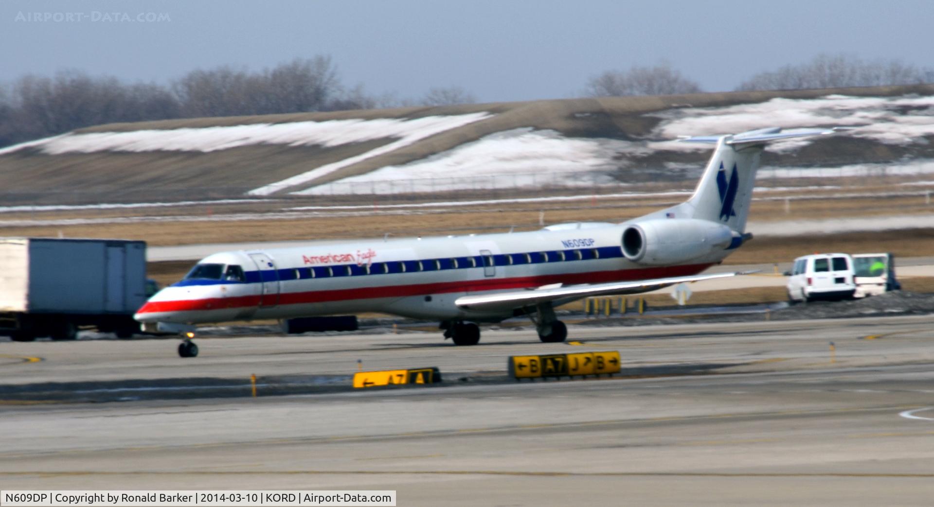 N609DP, 1998 Embraer ERJ-145LR (EMB-145LR) C/N 145069, Taxi Chicago