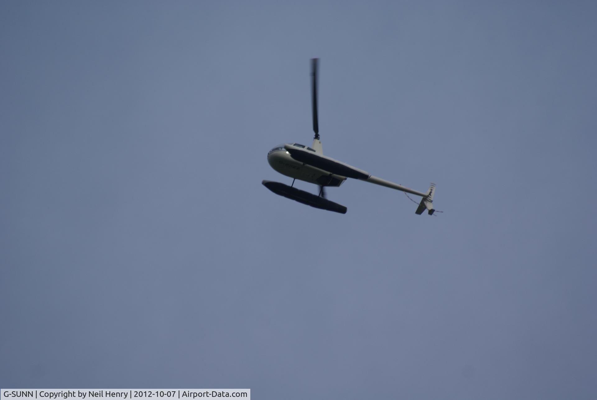 G-SUNN, 2004 Robinson R44 Clipper C/N 1367, over flying Arundel, West Sussex, UK