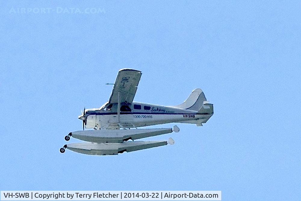 VH-SWB, 1964 De Havilland Canada DHC-2 C/N 1557, 1964 De Havilland Canada DHC-2, c/n: 1557 over Sydney Harbour