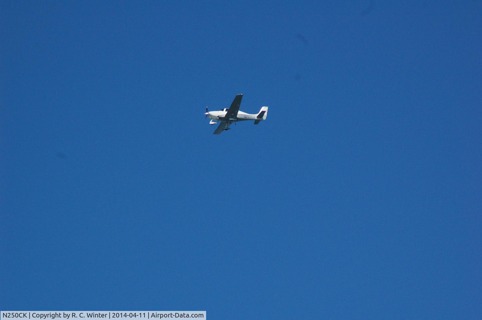 N250CK, 2009 Cirrus SR22X C/N 3421, today (4-11-2014) at 12.15 hrs. above lake Markermeer in The Netherlands. Close to the city of Almere.