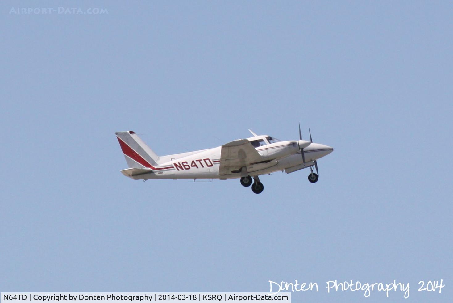 N64TD, 1963 Piper PA-30 Twin Comanche C/N 30-170, Piper Twin Commanche (N64TD) departs Sarasota-Bradenton International Airport