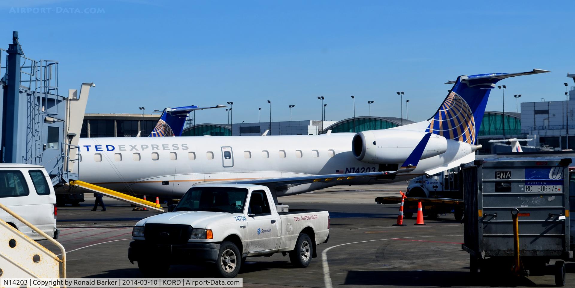 N14203, 2006 Embraer ERJ-145XR (EMB-145XR) C/N 14500964, Crowded ramp Chicago
