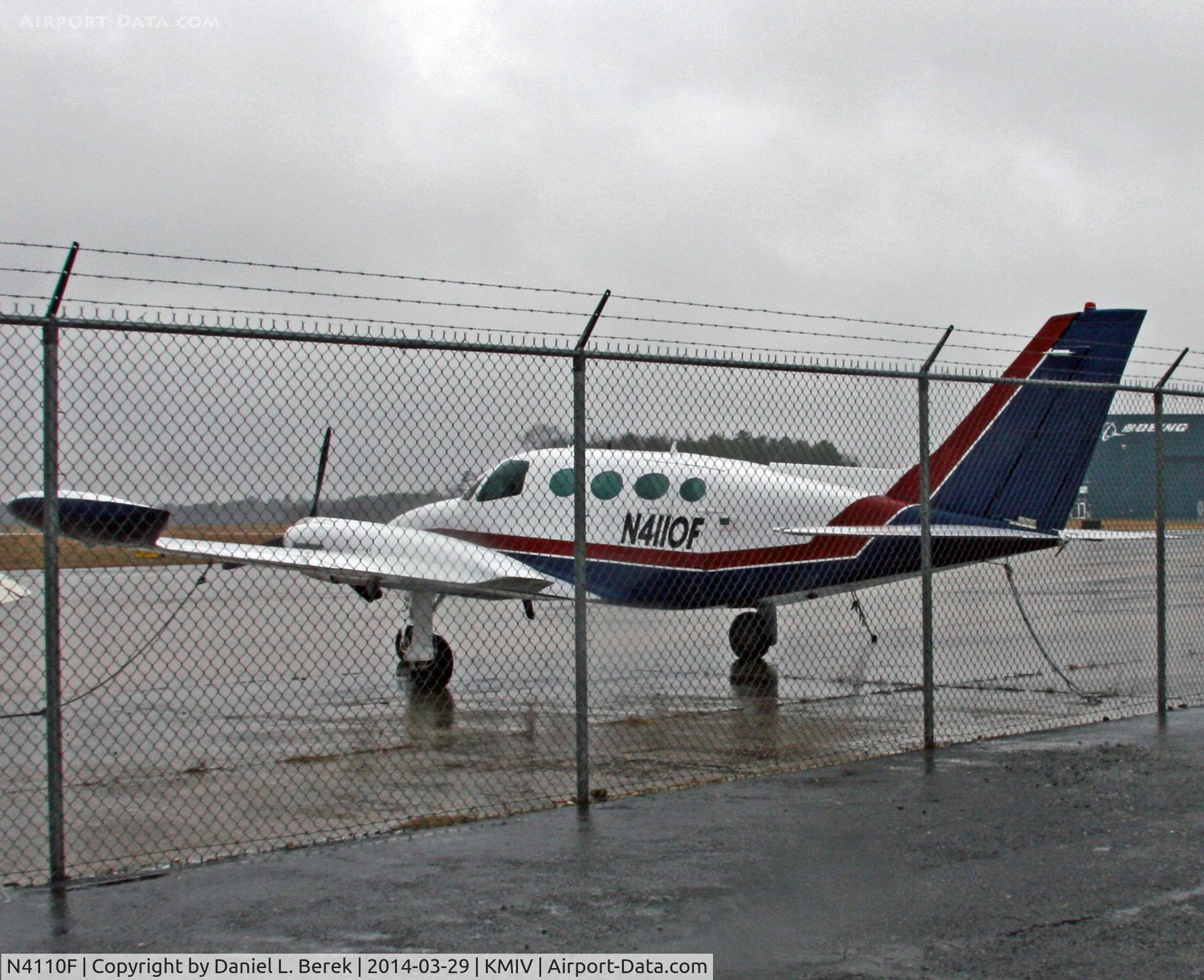 N4110F, 1965 Cessna 411 C/N 411-0108, Local corporate transport waits for better weather at Millville.