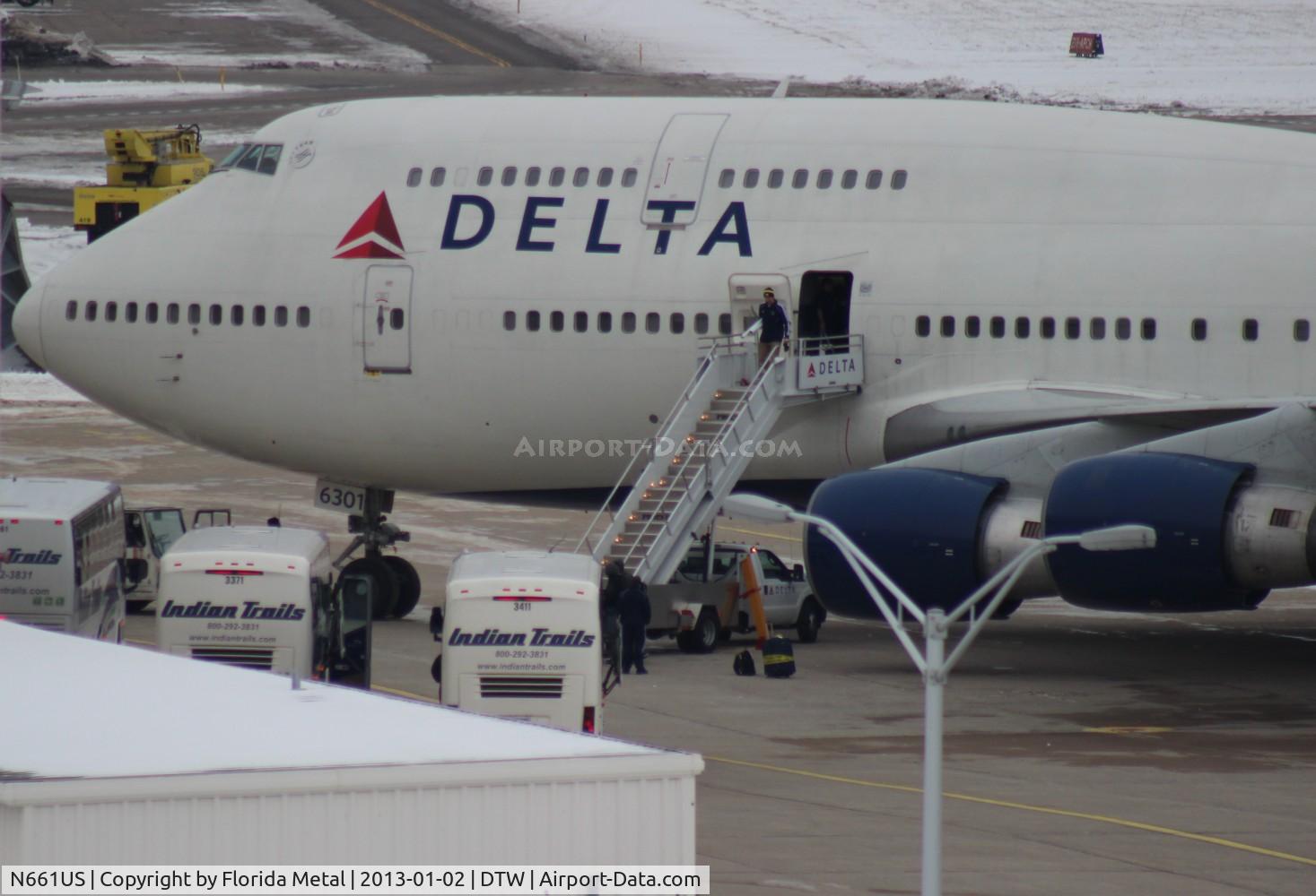 N661US, 1989 Boeing 747-451 C/N 23719, Delta 747-400 with University of Michigan football team returning from Outback Bowl in Tampa