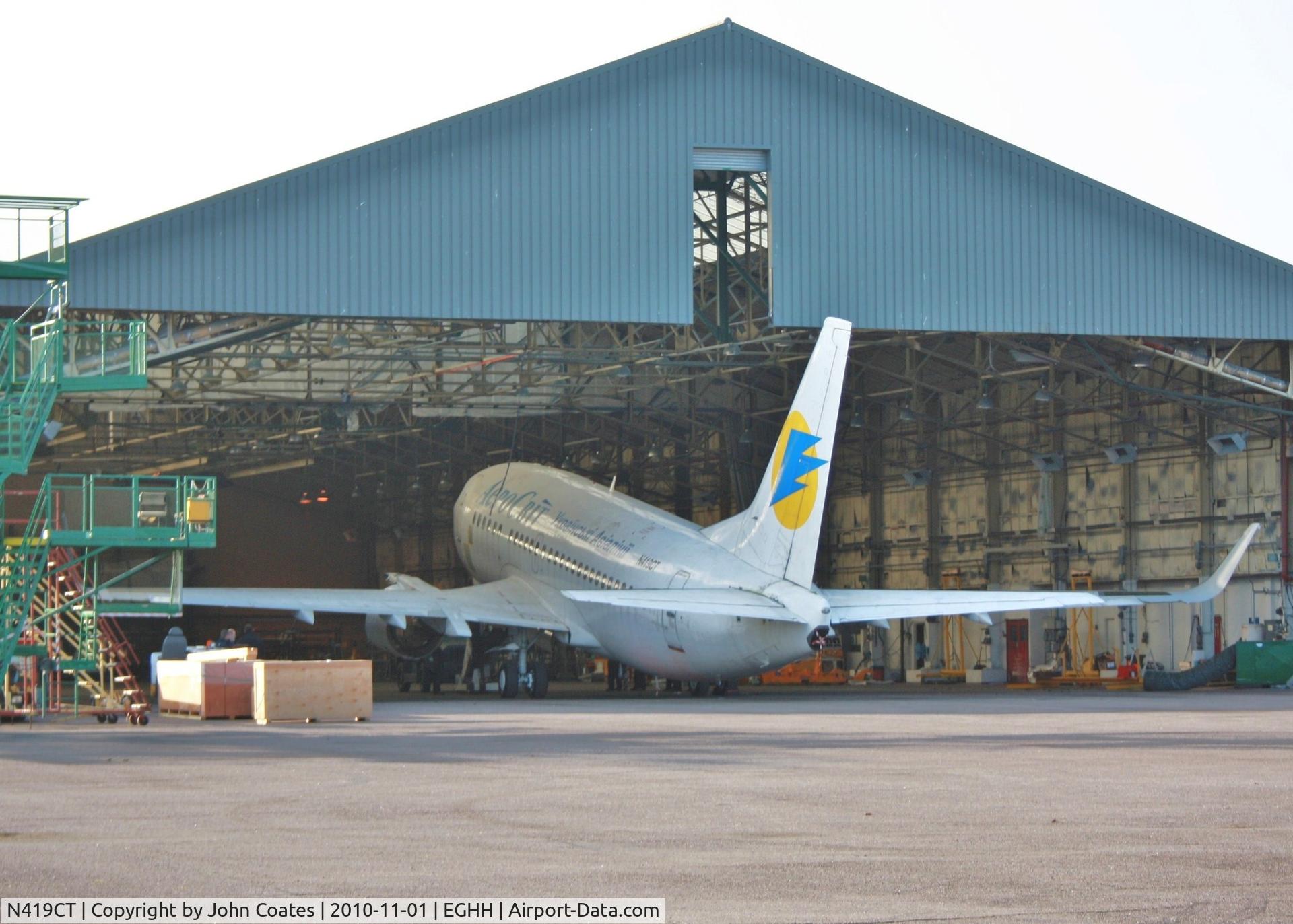 N419CT, 1991 Boeing 737-529 C/N 25419, Exiting hangar at European Avn.