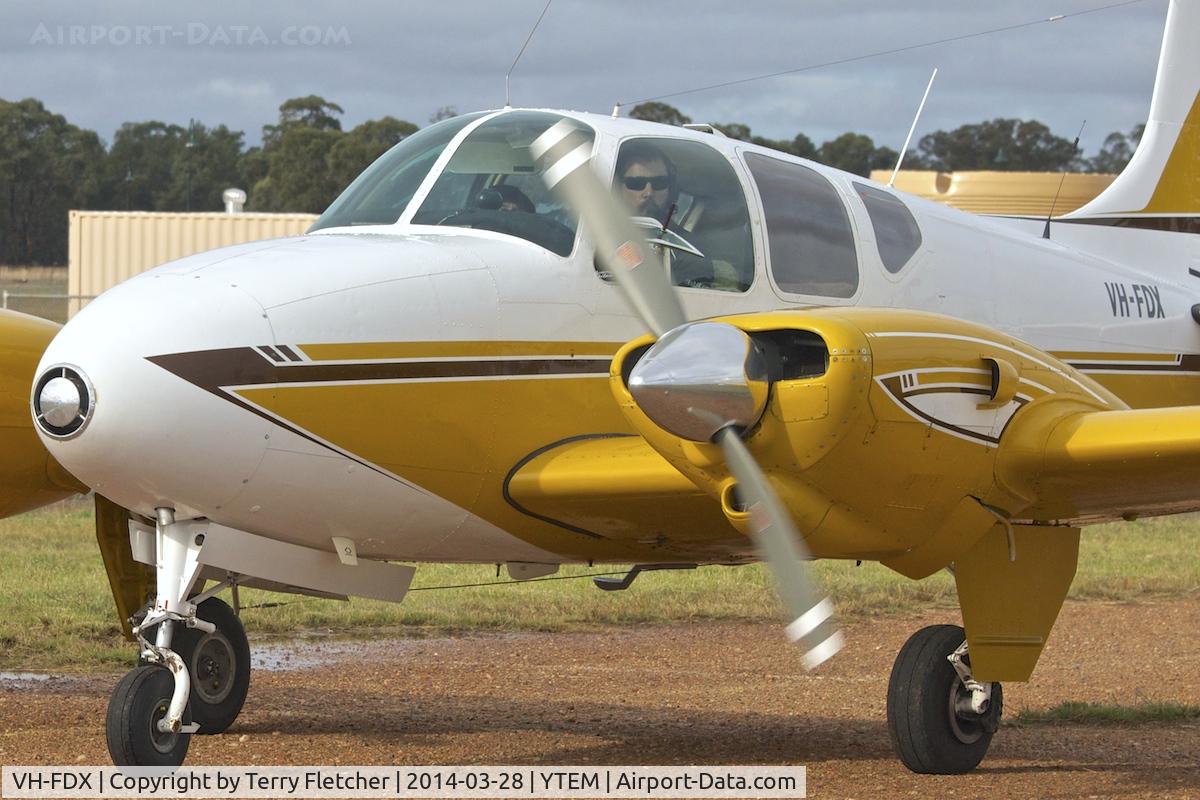 VH-FDX, 1960 Beech B95 Travel Air C/N TD-411, At Temora Airport during the 40th Anniversary Fly-In of the Australian Antique Aircraft Association