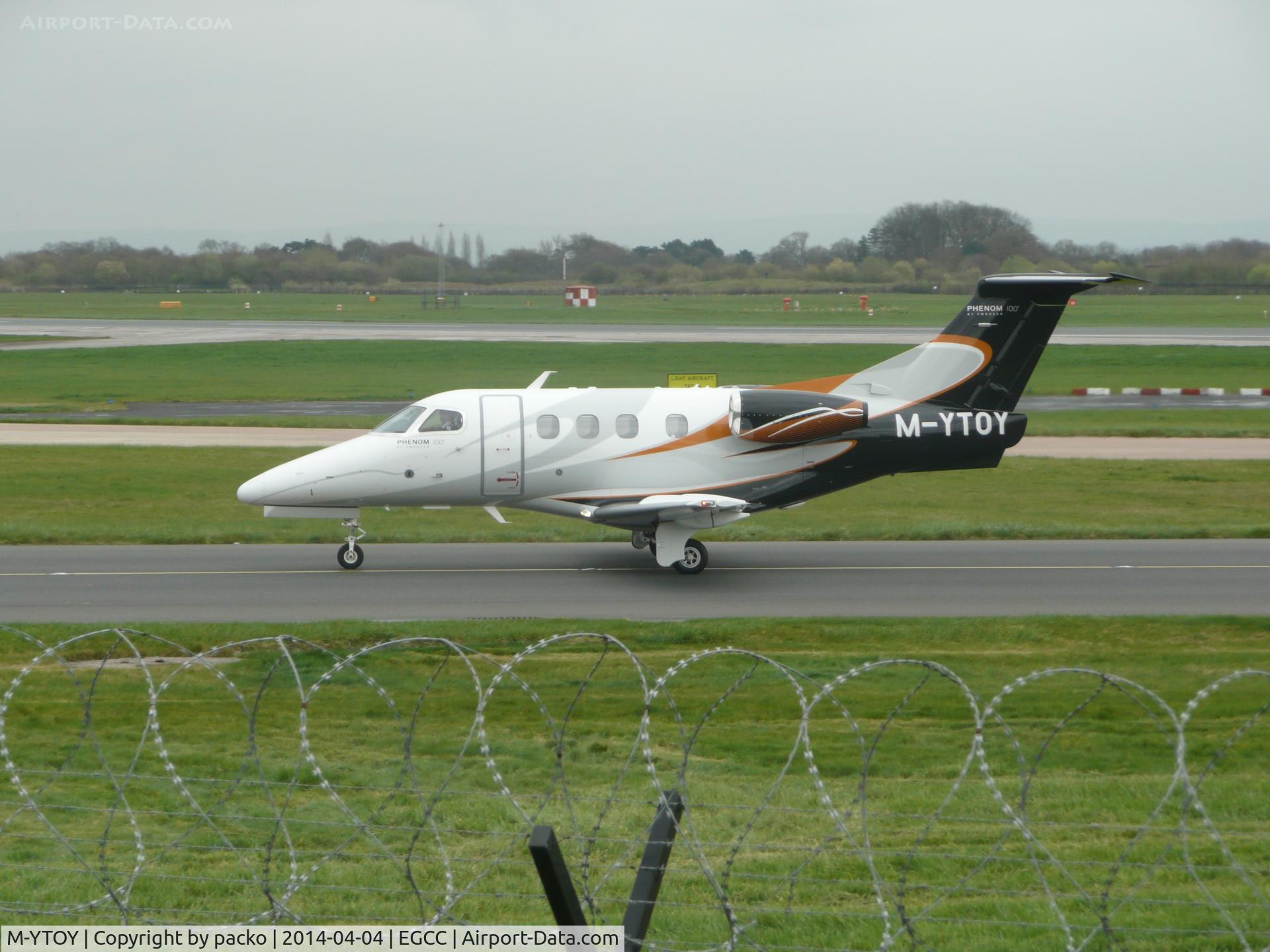 M-YTOY, 2009 Embraer EMB-500 Phenom 100 C/N 50000112, landed on 23L going onto the OCS RAMP